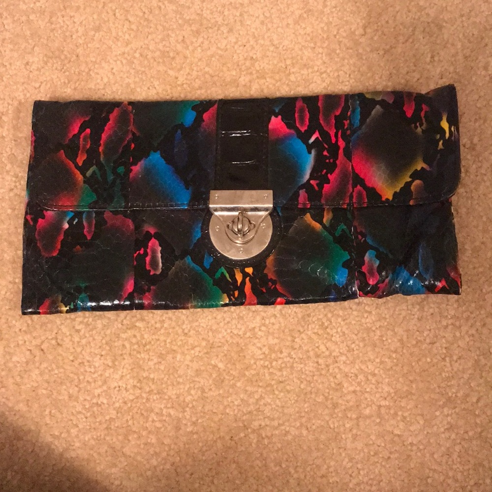 Colored snake skin clutch